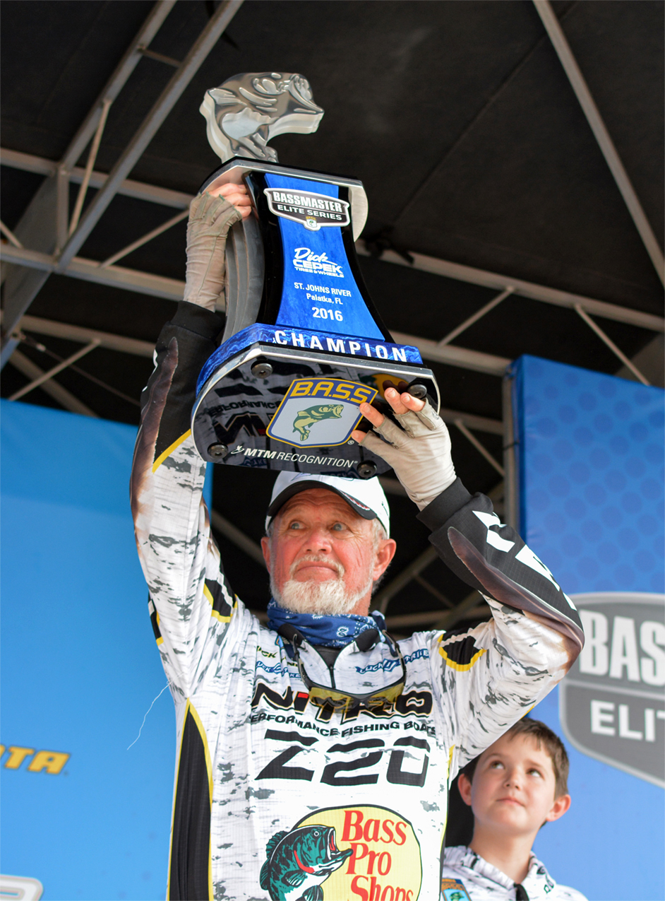 rick-clunn-moment-of-victory-with-son-river-looking-on